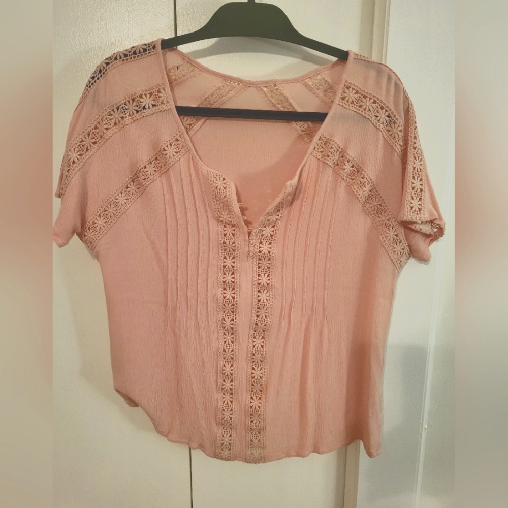 Pale pink hollow out top size M